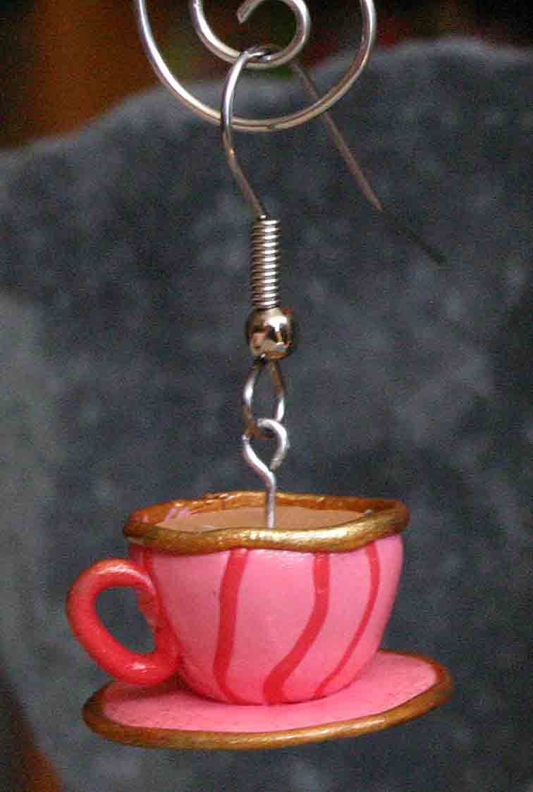 Pink cup with red stripes
