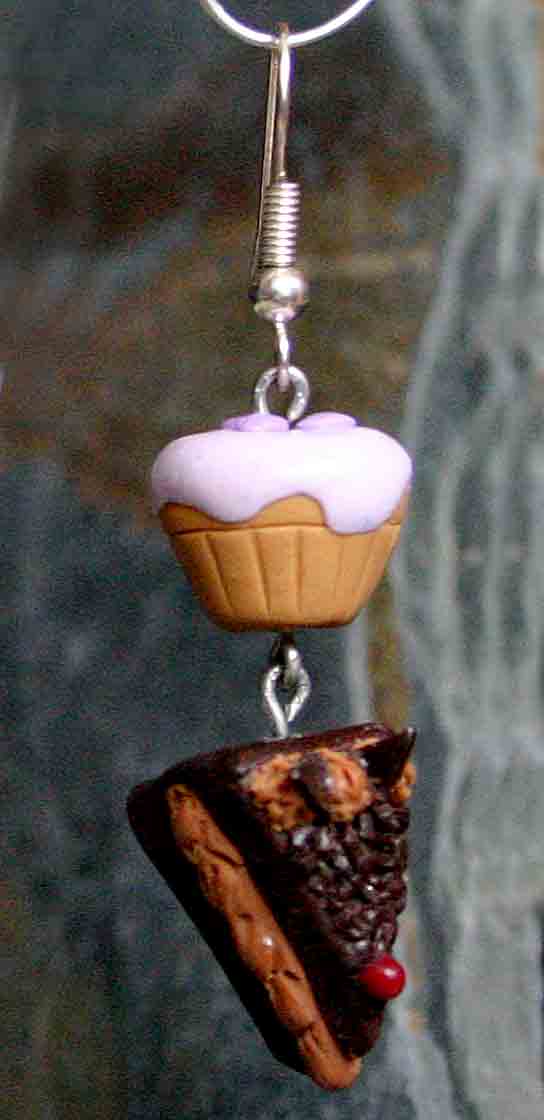 Cup-cake and a slice of chocolate cake